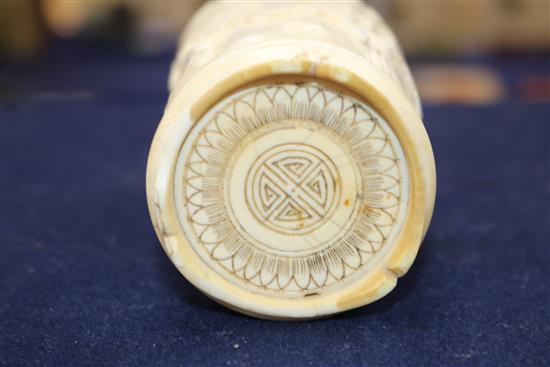 A Chinese ivory brush pot carved with prunus, calligraphy, etc. and an ivory seal H 10.5cm & 4cm